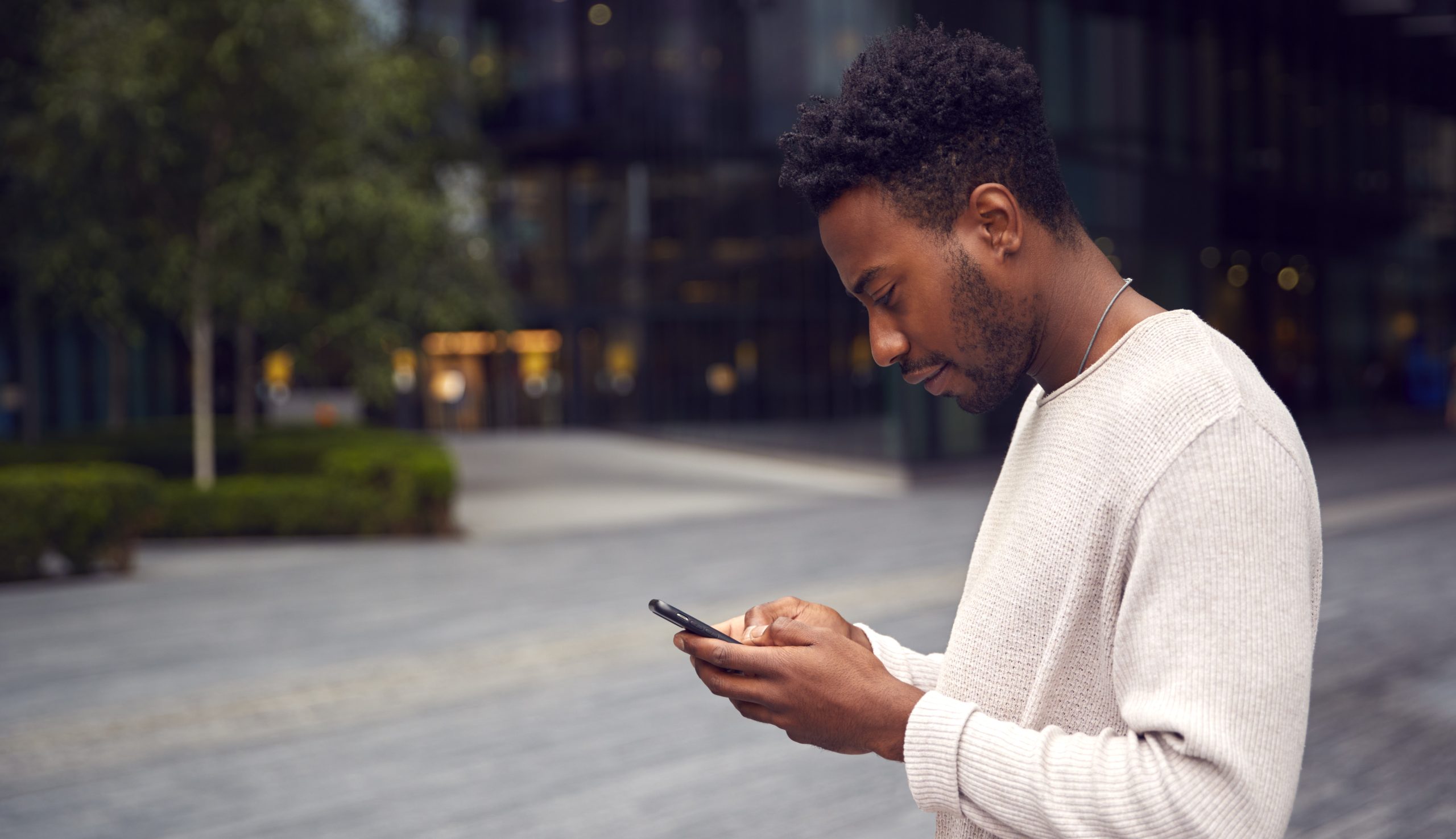 Male blogger posting to social media