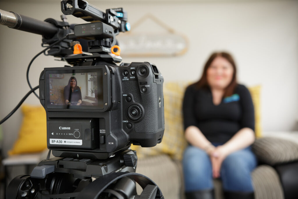 Image shows Canon C70 filming while interviewing business owner in Stoke-on-Trent