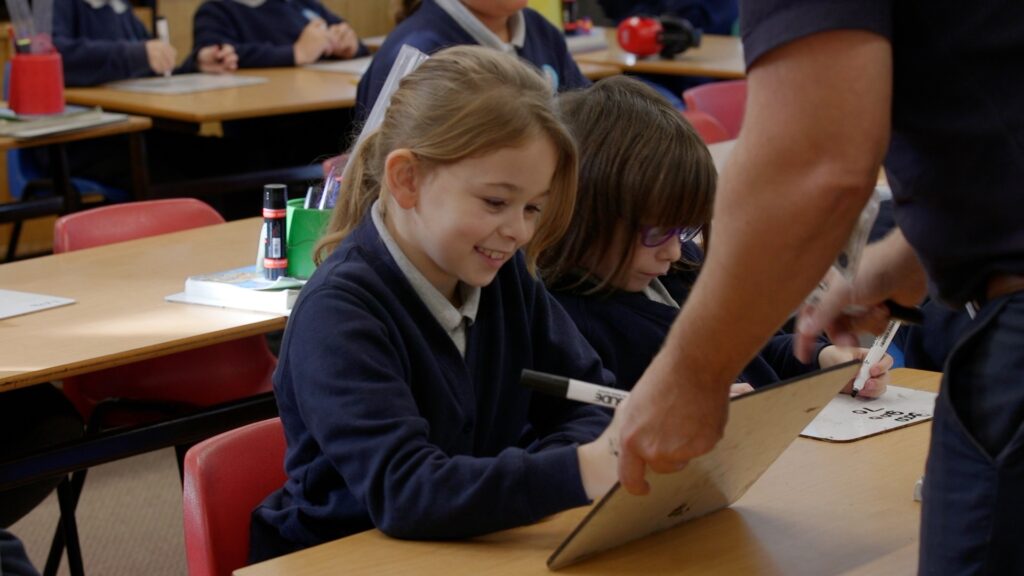 Pupil engaging in a maths lesson at Grange Primary School in Shropshire