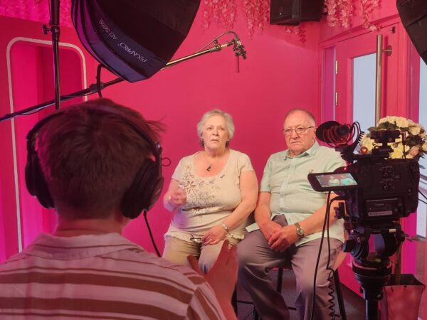Recording video testimonials with charity volunteers